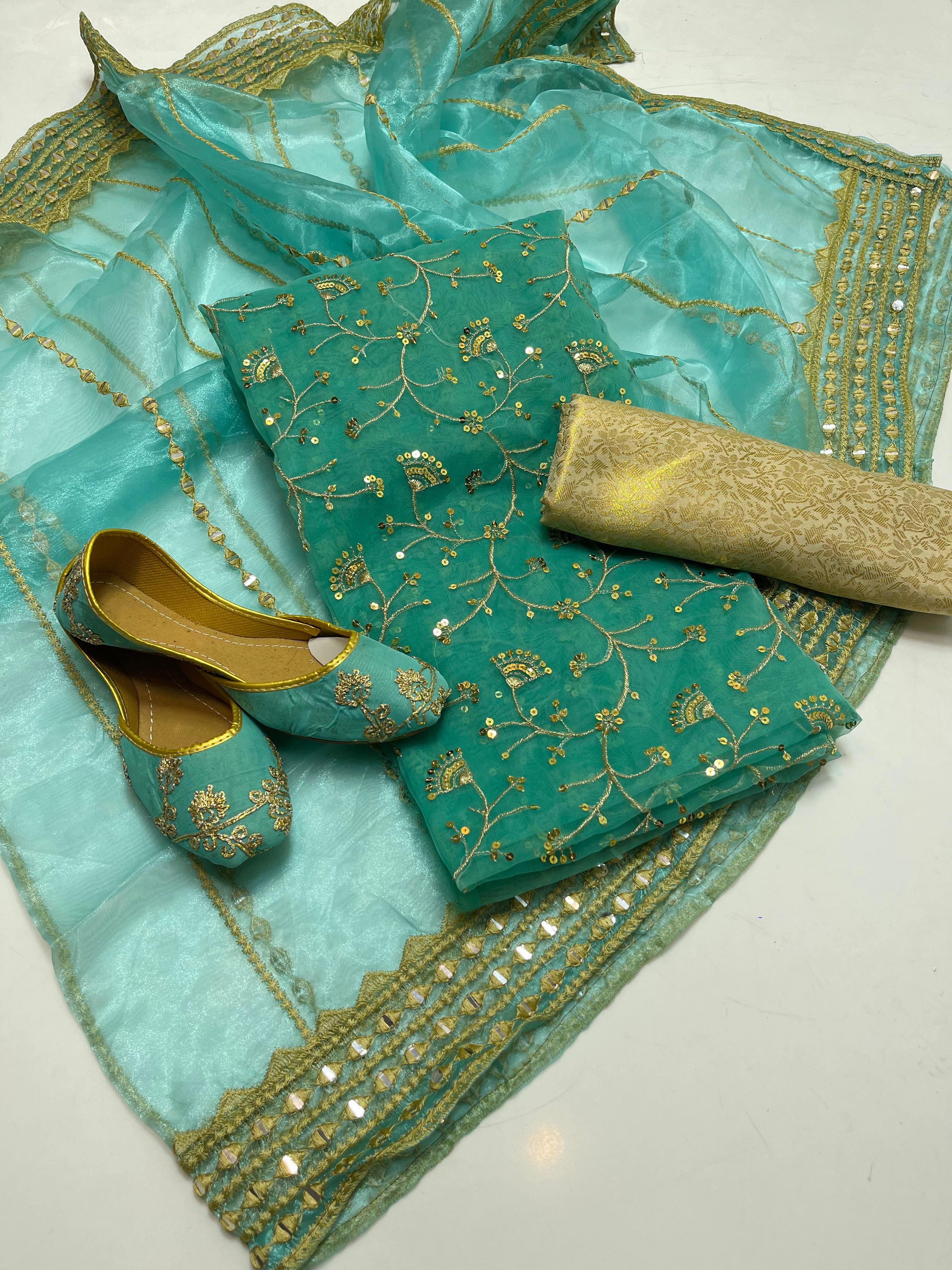 ✅Organza embroidery work shirt 
✅ tissue 9mm embroidery work duppata 
Jamawar banarsi trouser 
With beautiful khusa 
4piece dress 👗