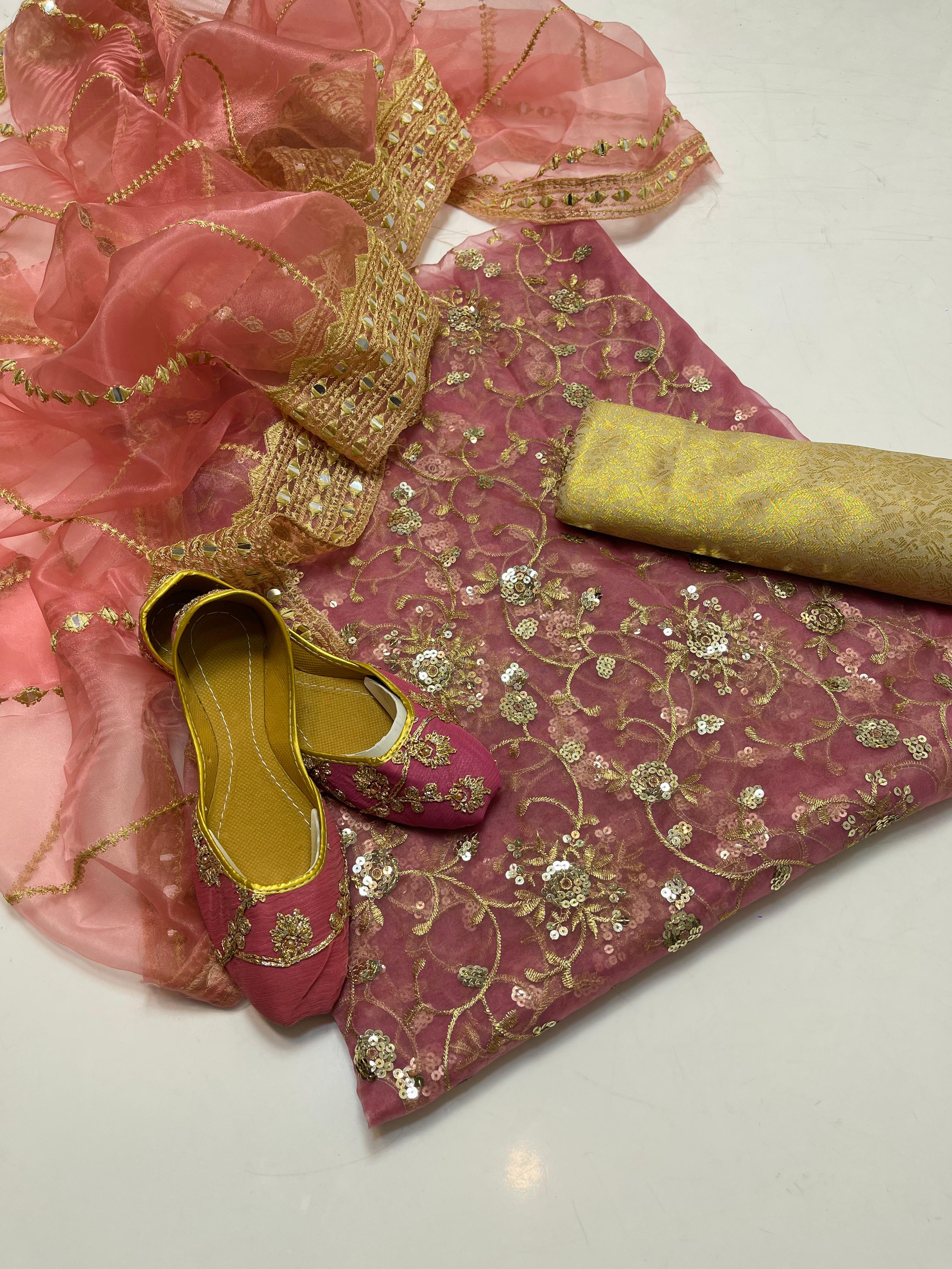 ✅Organza embroidery work shirt 
✅ tissue 9mm embroidery work duppata 
Jamawar banarsi trouser 
With beautiful khusa 
4piece dress 👗