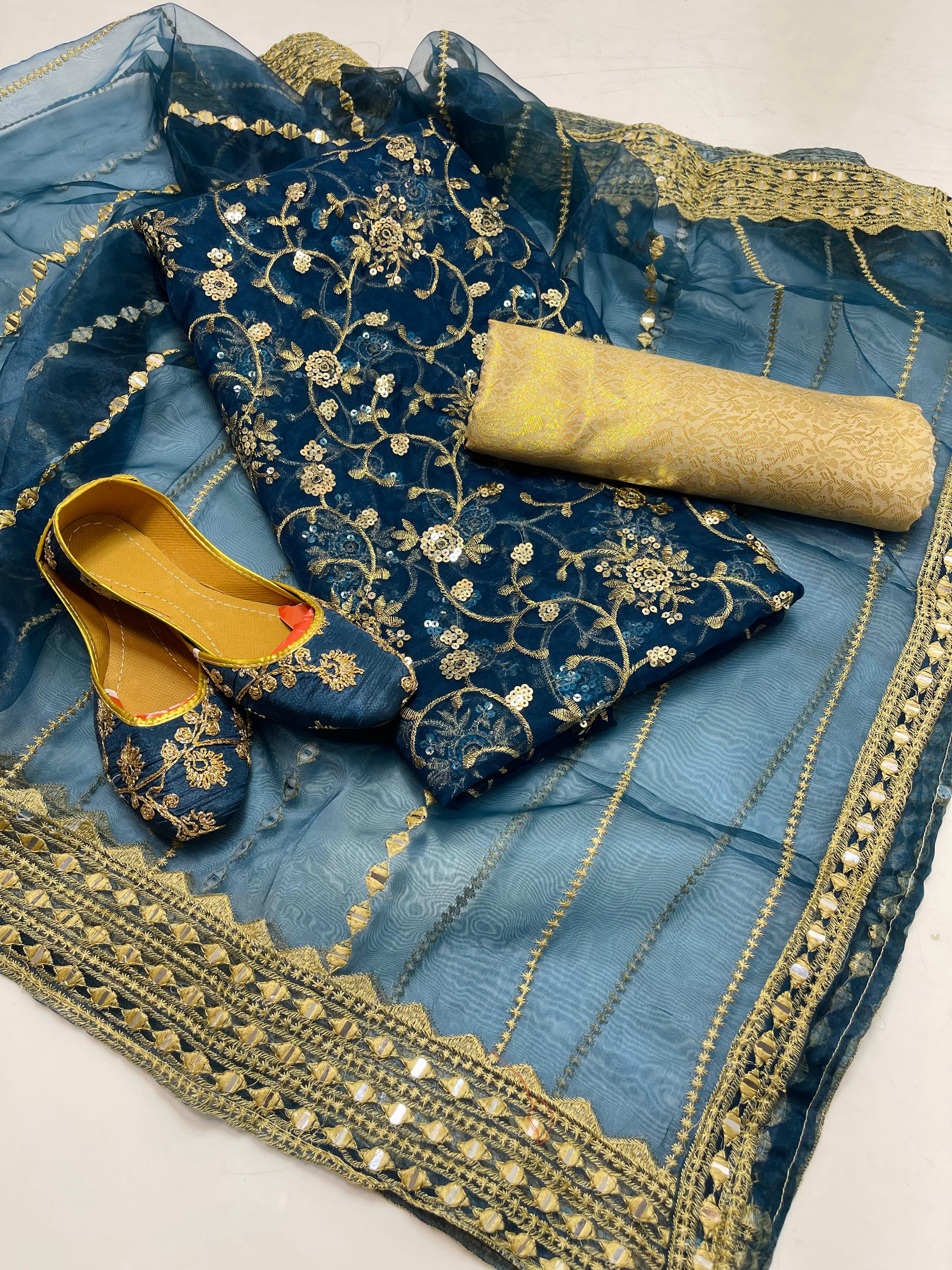 ✅Organza embroidery work shirt 
✅ tissue 9mm embroidery work duppata 
Jamawar banarsi trouser 
With beautiful khusa 
4piece dress 👗