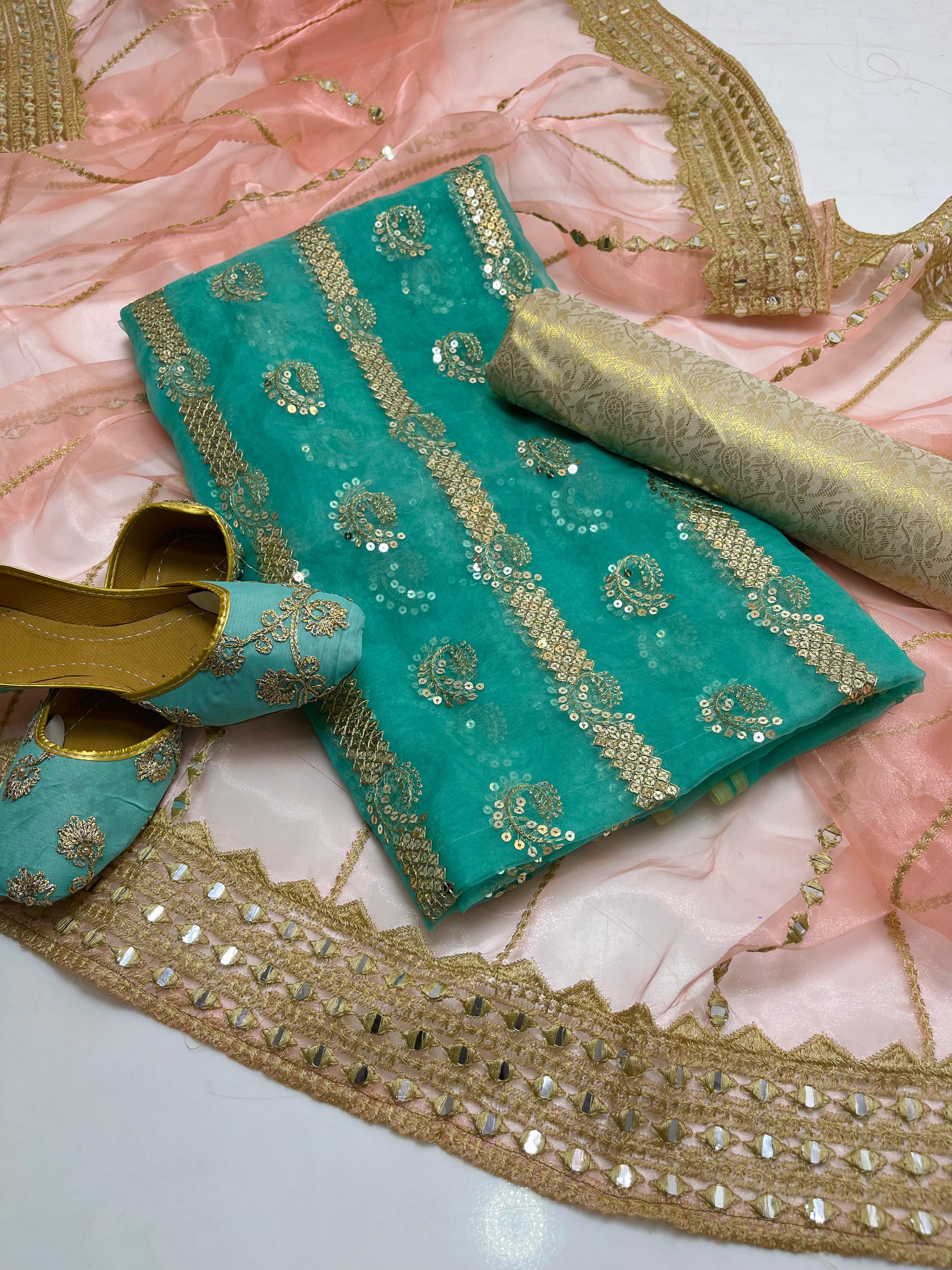 Organza embroidery front back same shirt 
Tissue beautiful embroidery work duppata 
Jamawar banarsi trouser 
With khusa