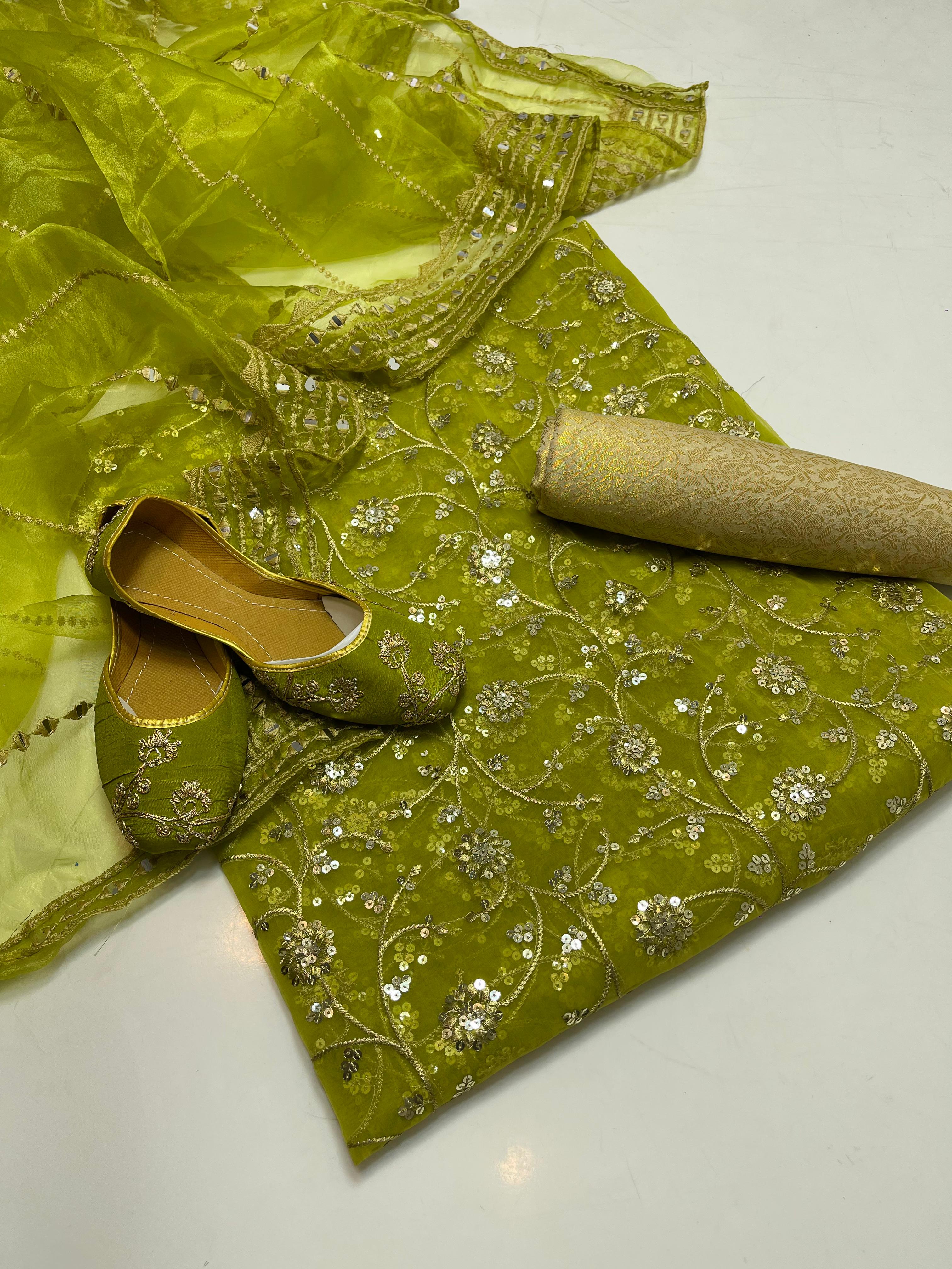 ✅Organza embroidery work shirt 
✅ tissue 9mm embroidery work duppata 
Jamawar banarsi trouser 
With beautiful khusa 
4piece dress 👗