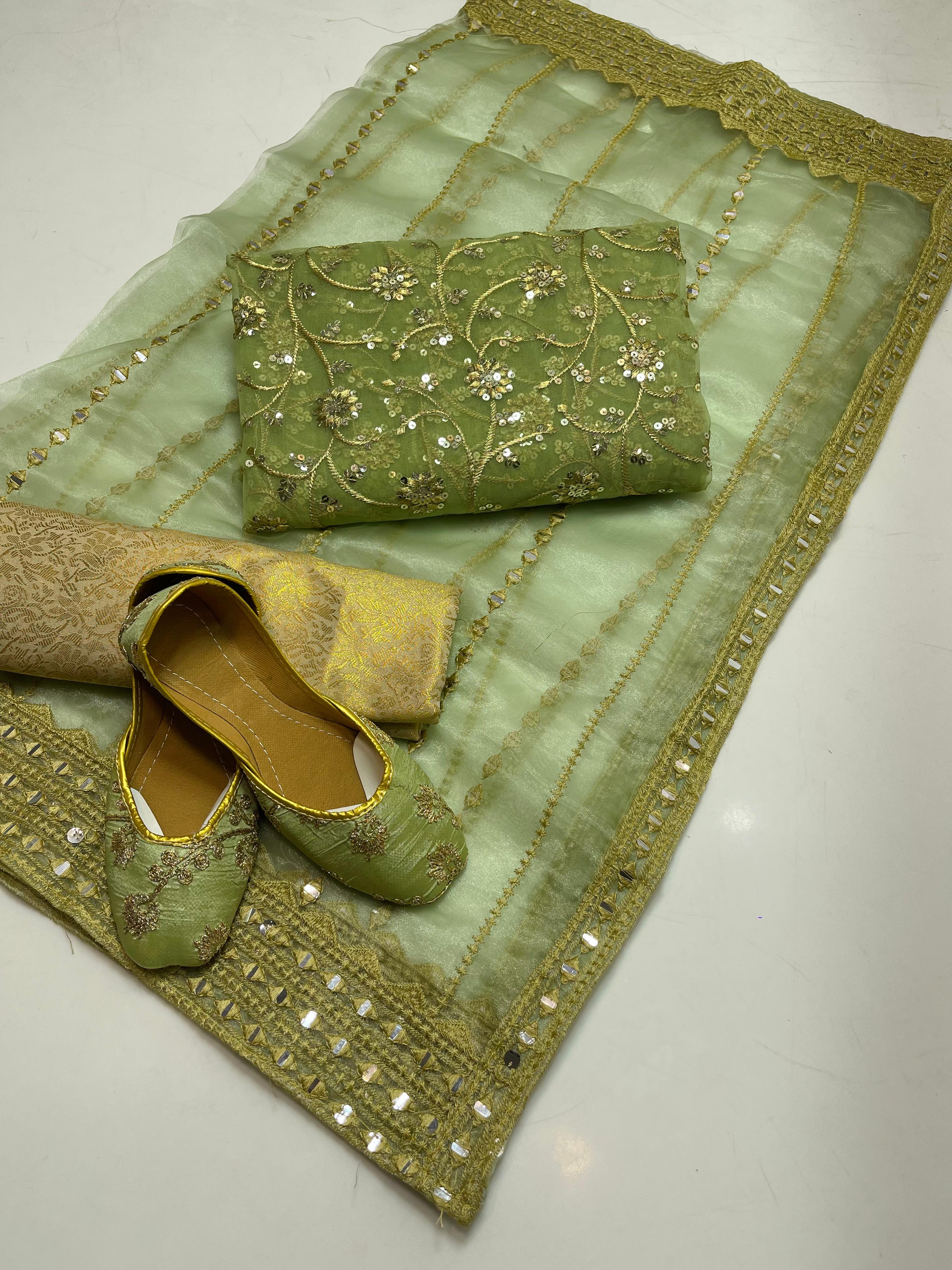 ✅Organza embroidery work shirt 
✅ tissue 9mm embroidery work duppata 
Jamawar banarsi trouser 
With beautiful khusa 
4piece dress 👗