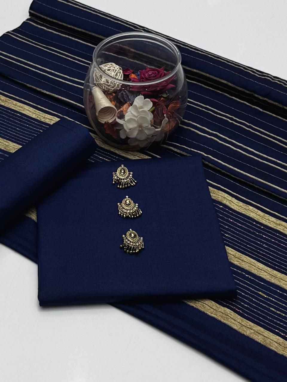Embrace The Elegance of Mid Season Multani Khaddi Susi Plain Shirt, Plain Trouser & Paired with a luxurious Jacquard Velvet Border Khaddi Susi Shawl 3 Pc