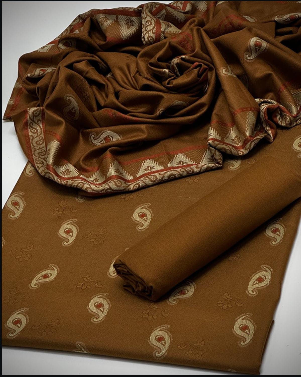 *Shirt 🥰❤️* heavy all over broshia design work 
*Trouser 🥰❤️* dhanak marina plain
*Shawl* dhanak marina all over beautiful broshia work
With beautiful design work borders