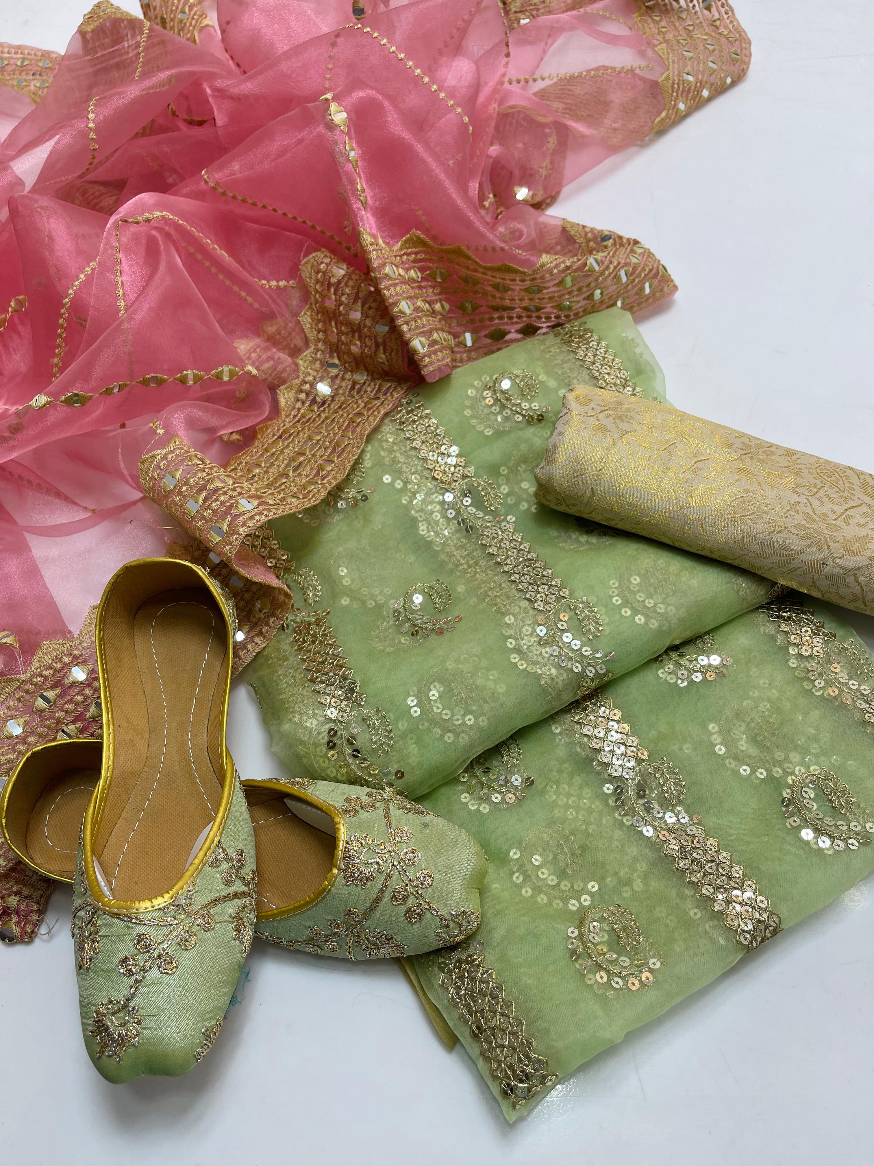 Organza embroidery front back same shirt 
Tissue beautiful embroidery work duppata 
Jamawar banarsi trouser 
With khusa