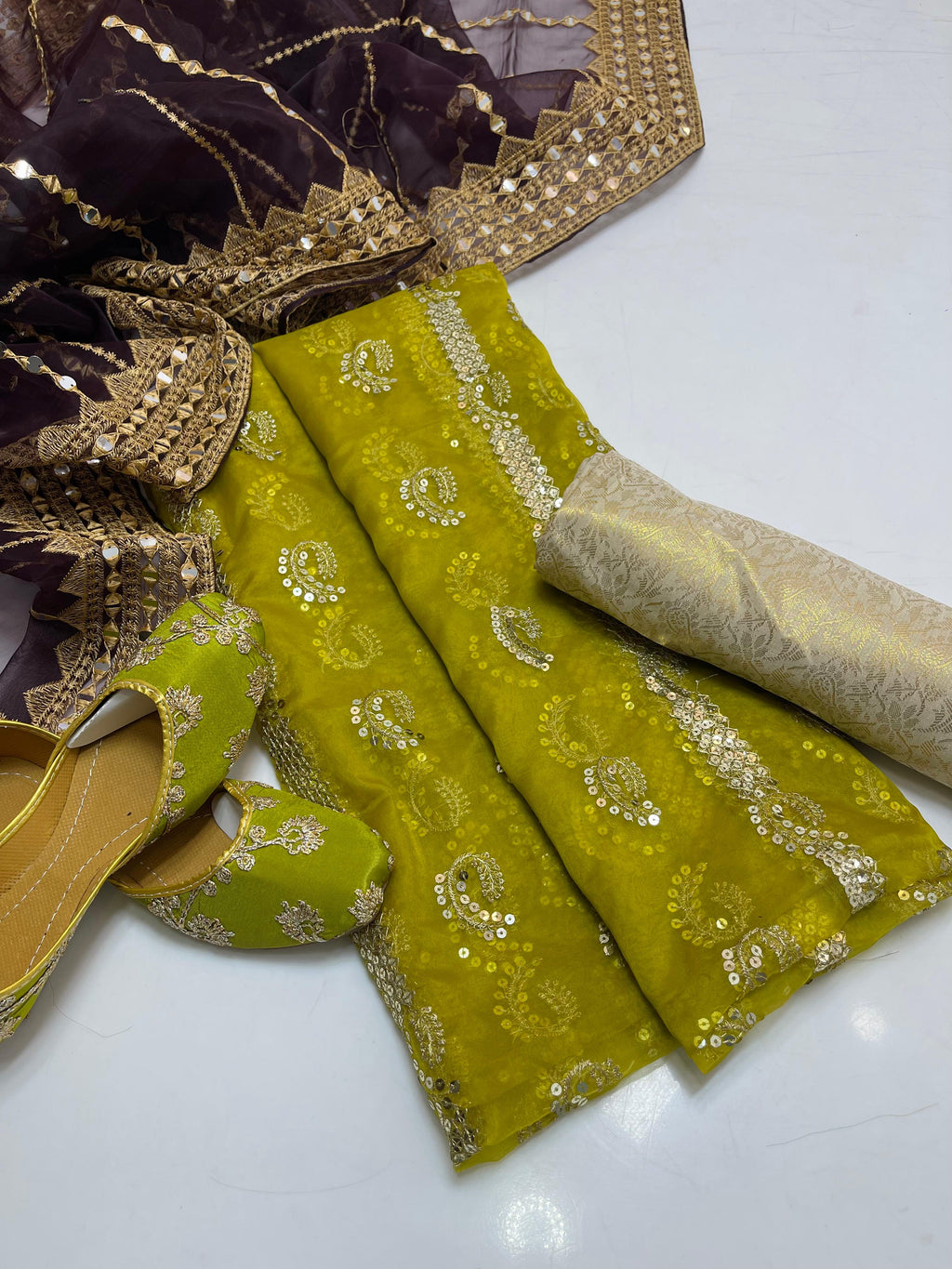 Organza embroidery front back same shirt 
Tissue beautiful embroidery work duppata 
Jamawar banarsi trouser 
With khusa