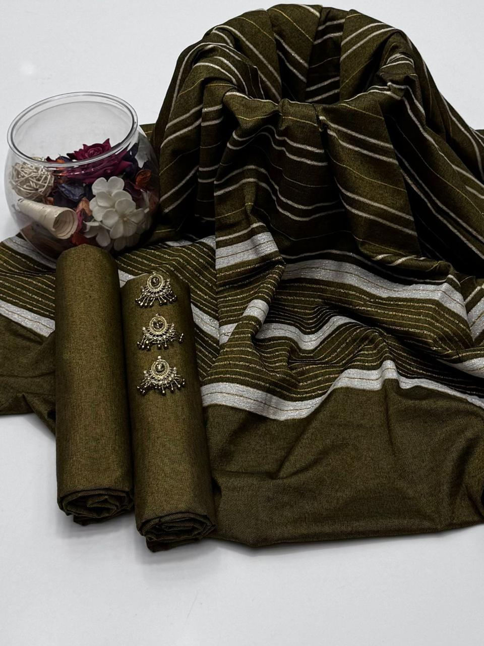 Embrace The Elegance of Mid Season Multani Khaddi Susi Plain Shirt, Plain Trouser & Paired with a luxurious Jacquard Velvet Border Khaddi Susi Shawl 3 Pc