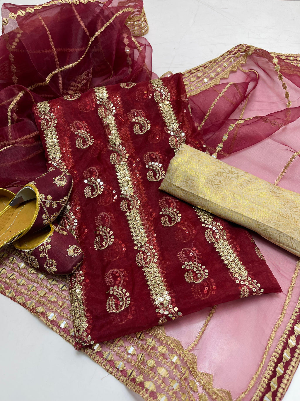 Organza embroidery front back same shirt 
Tissue beautiful embroidery work duppata 
Jamawar banarsi trouser 
With khusa