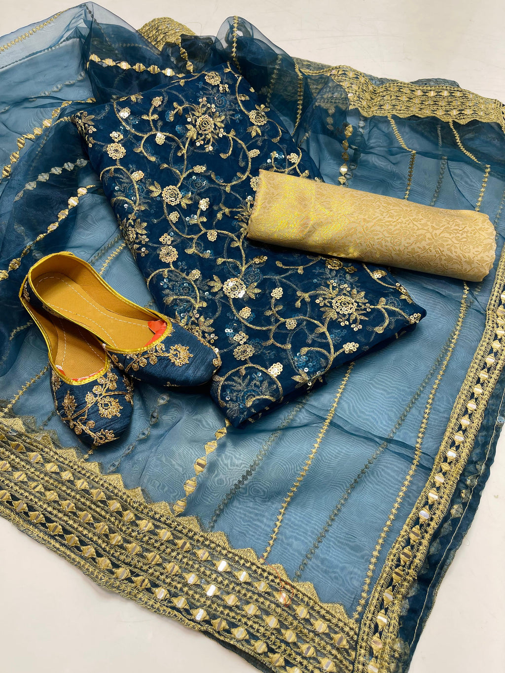 ✅Organza embroidery work shirt 
✅ tissue 9mm embroidery work duppata 
Jamawar banarsi trouser 
With beautiful khusa 
4piece dress 👗
