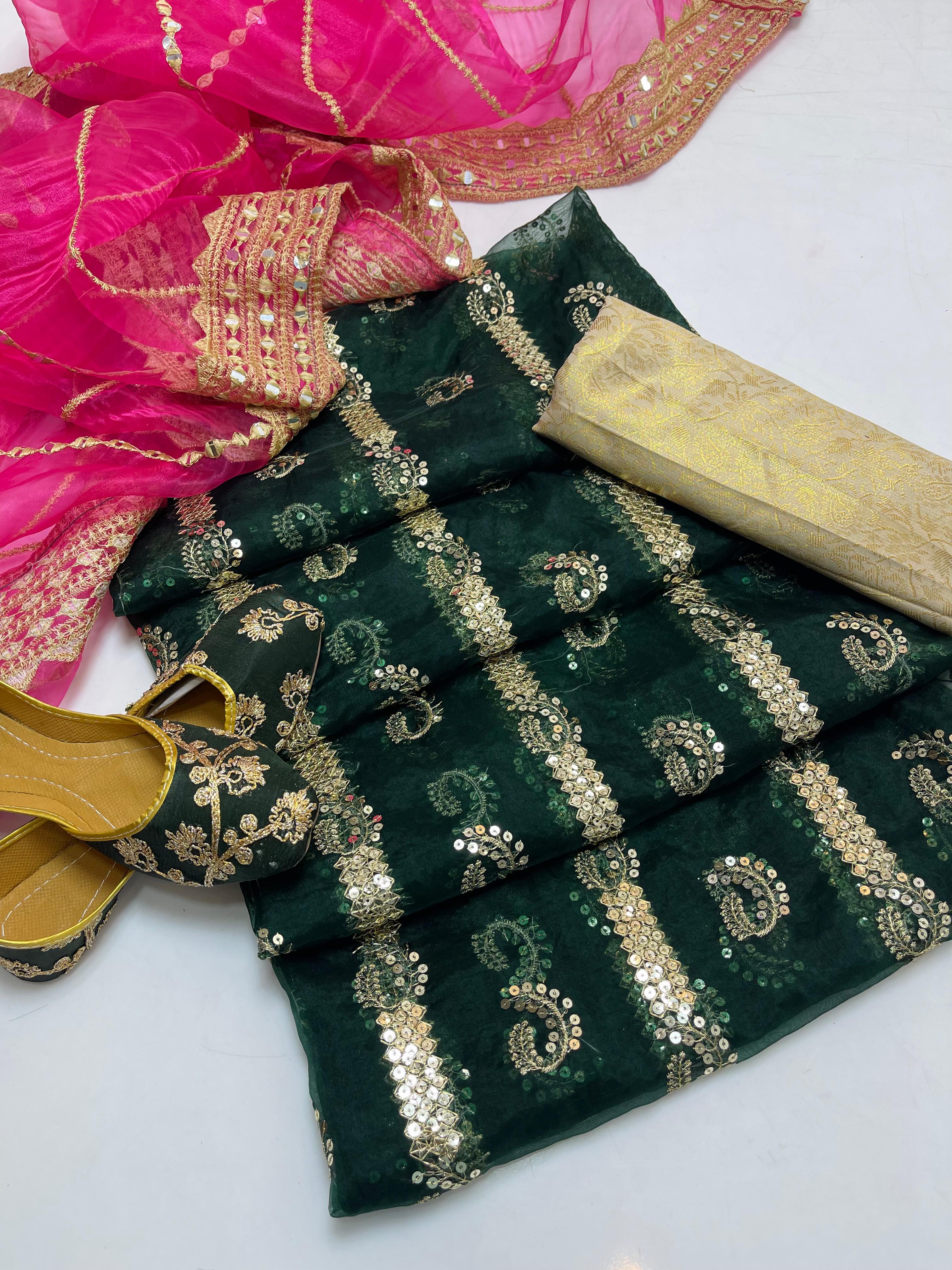 Organza embroidery front back same shirt 
Tissue beautiful embroidery work duppata 
Jamawar banarsi trouser 
With khusa
