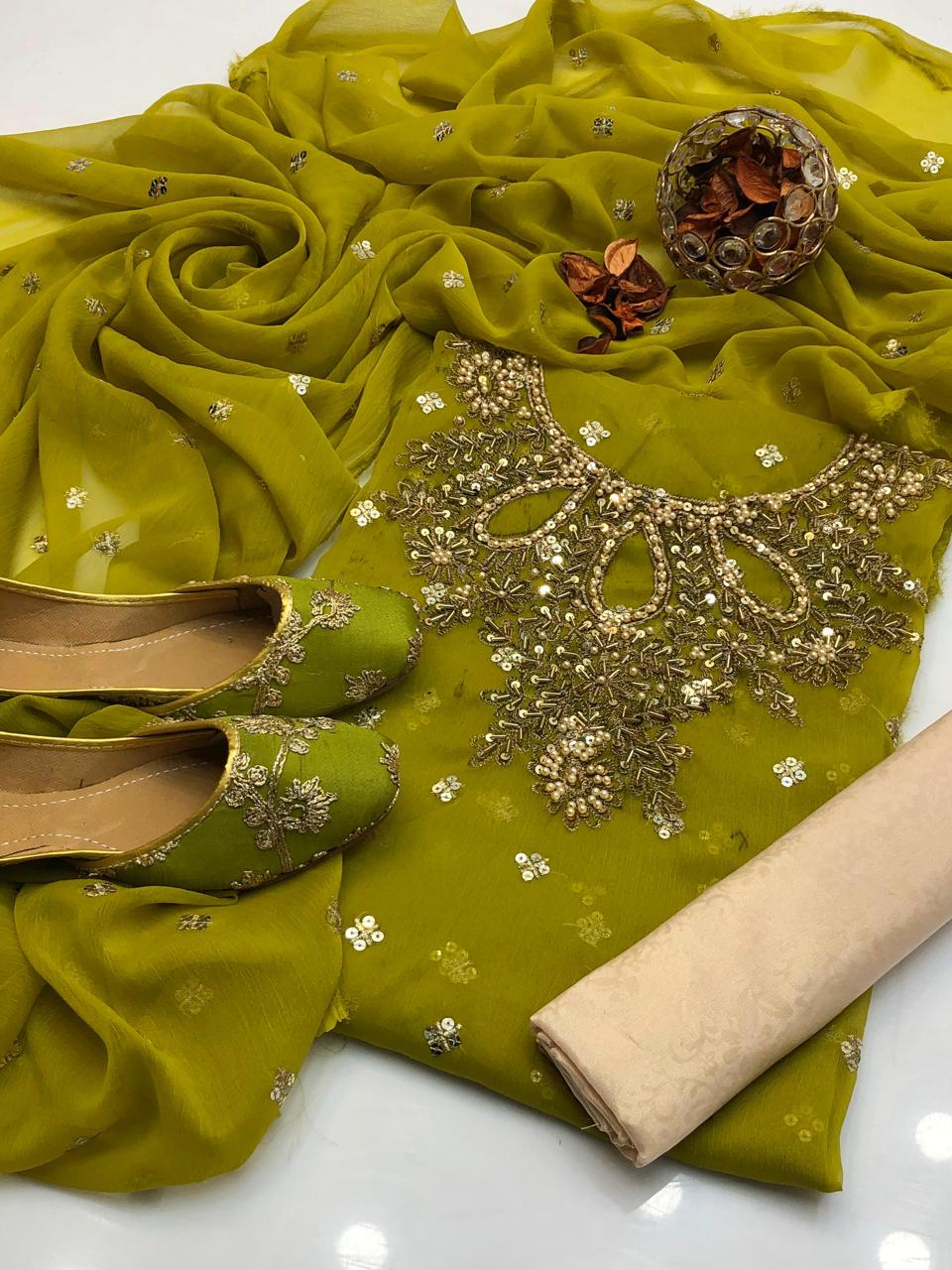 Handmade collection 
Most Beautiful & demanded article 
Shafon boti work & handmad work shirt
Shafon boti work duppata
Masoori trouser
With khusa for gift 🎁 (6-10)