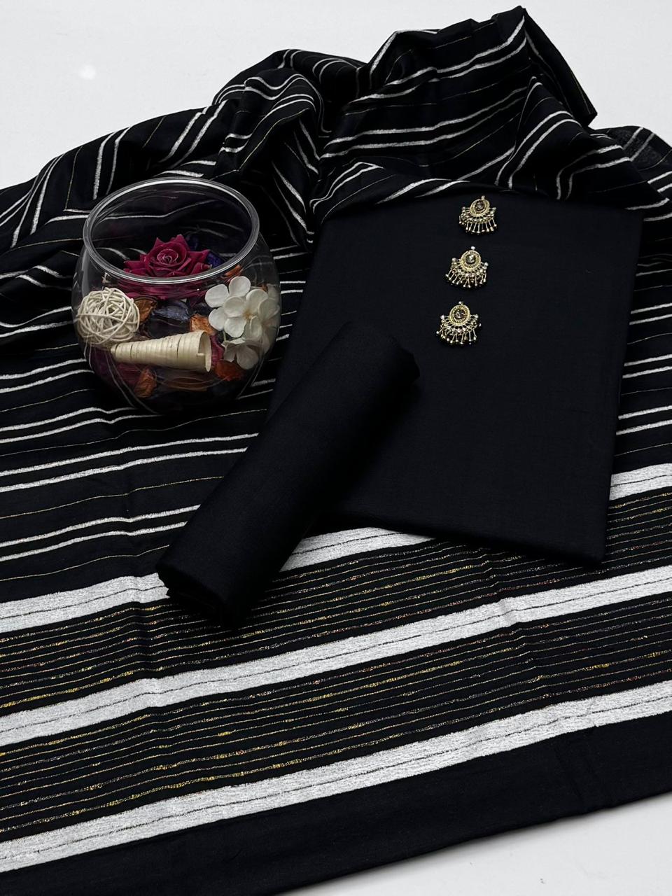 Embrace The Elegance of Mid Season Multani Khaddi Susi Plain Shirt, Plain Trouser & Paired with a luxurious Jacquard Velvet Border Khaddi Susi Shawl 3 Pc