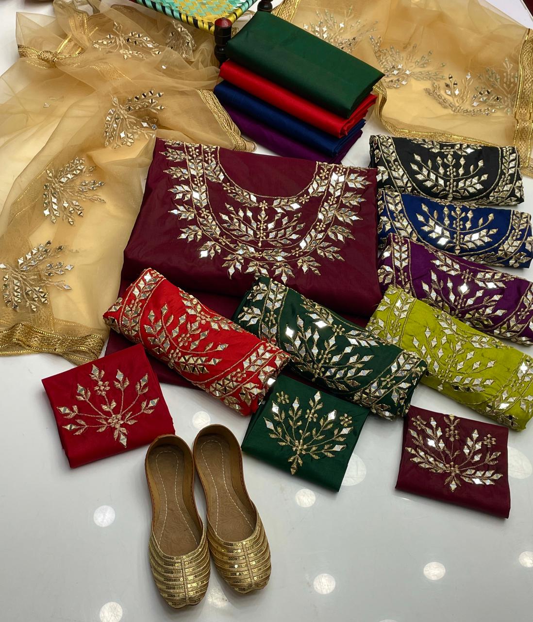 Raw Silk Mirror work Shirt Neck , Sleeves work , Net mirror dupatta,along Raw silk trouser