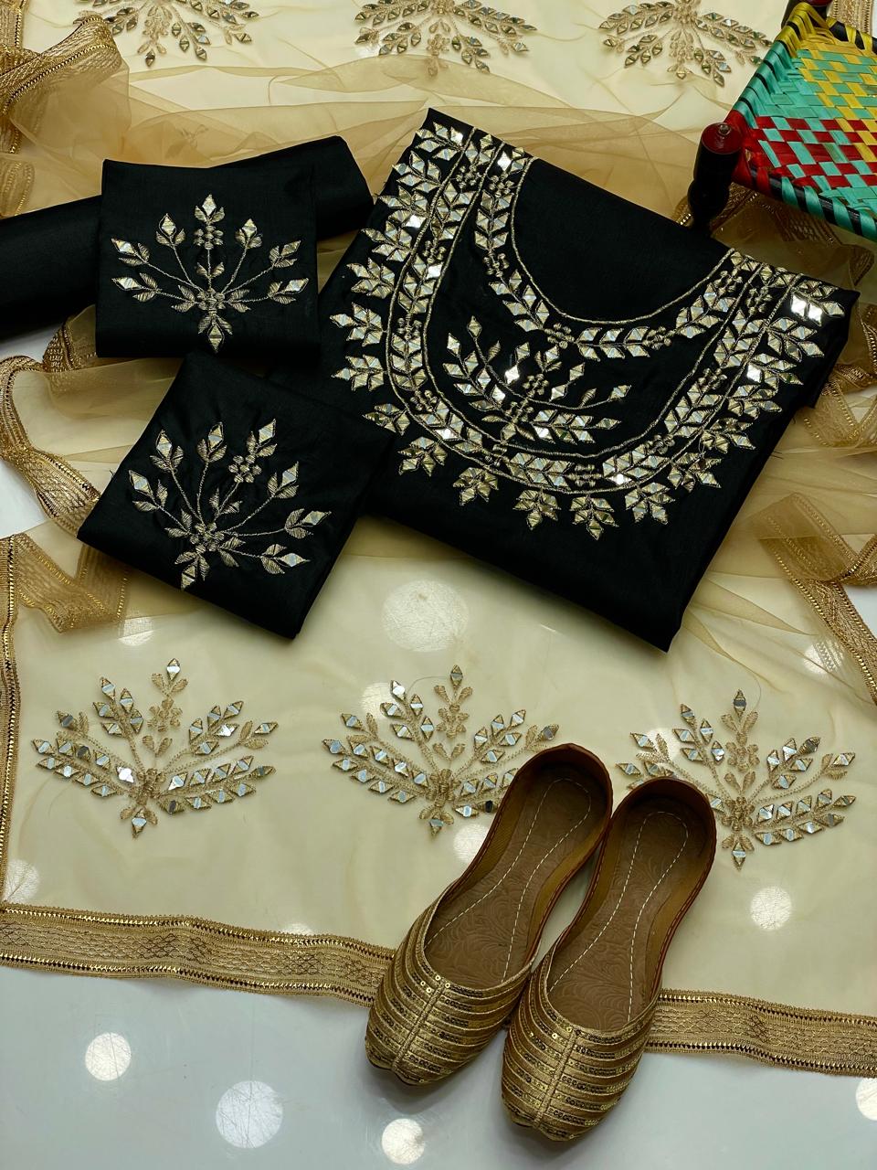 Raw Silk Mirror work Shirt Neck , Sleeves work , Net mirror dupatta,along Raw silk trouser