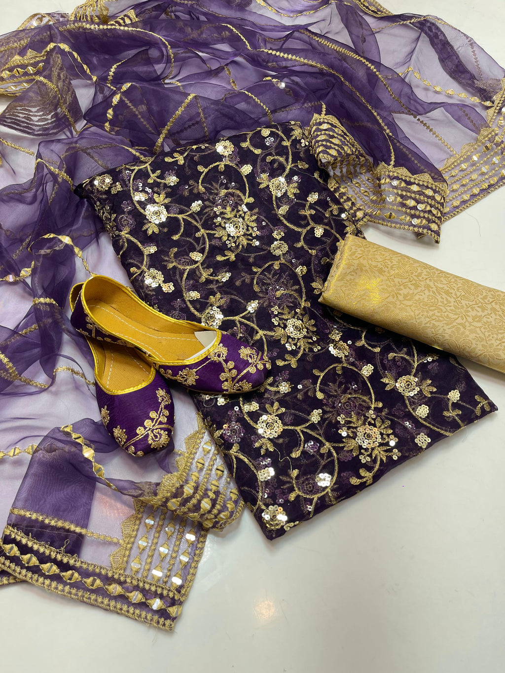 ✅Organza embroidery work shirt 
✅ tissue 9mm embroidery work duppata 
Jamawar banarsi trouser 
With beautiful khusa 
4piece dress 👗