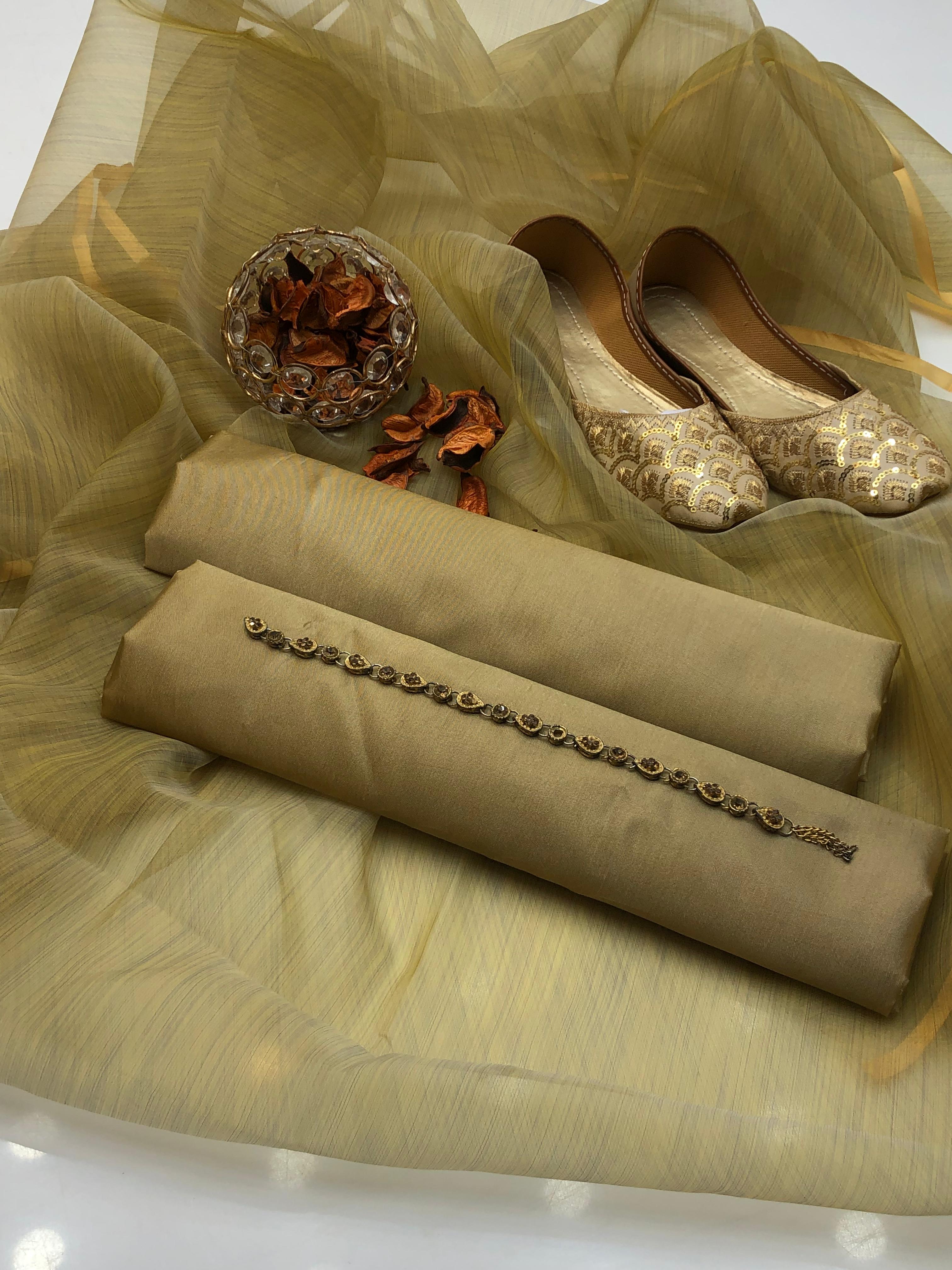 ✅Katan plan shirt
✅Organza zari border duppata 
✅Kataan silk trouser 
✅ with khusa