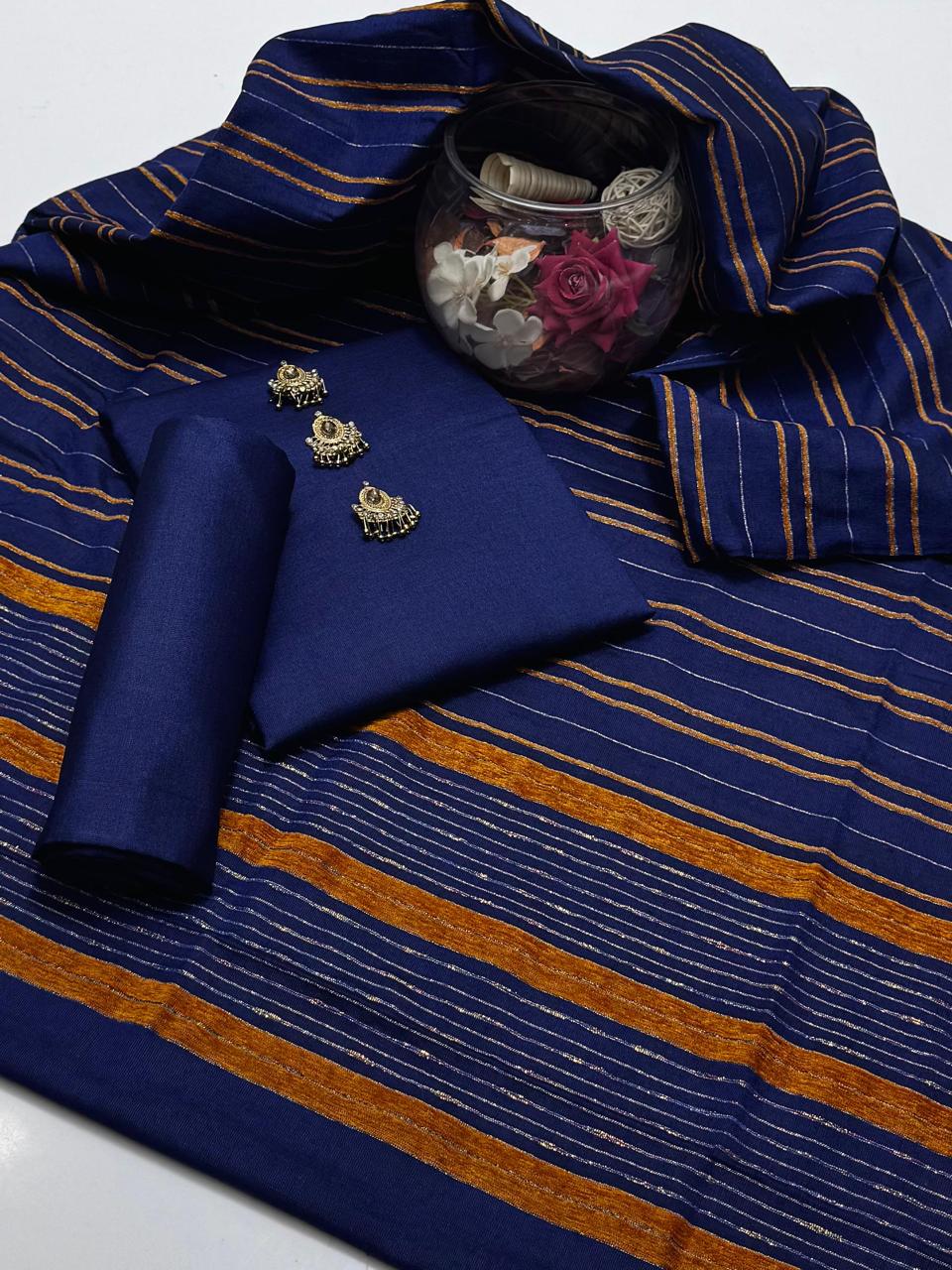 Embrace The Elegance of Mid Season Multani Khaddi Susi Plain Shirt, Plain Trouser & Paired with a luxurious Jacquard Velvet Border Khaddi Susi Shawl 3 Pc