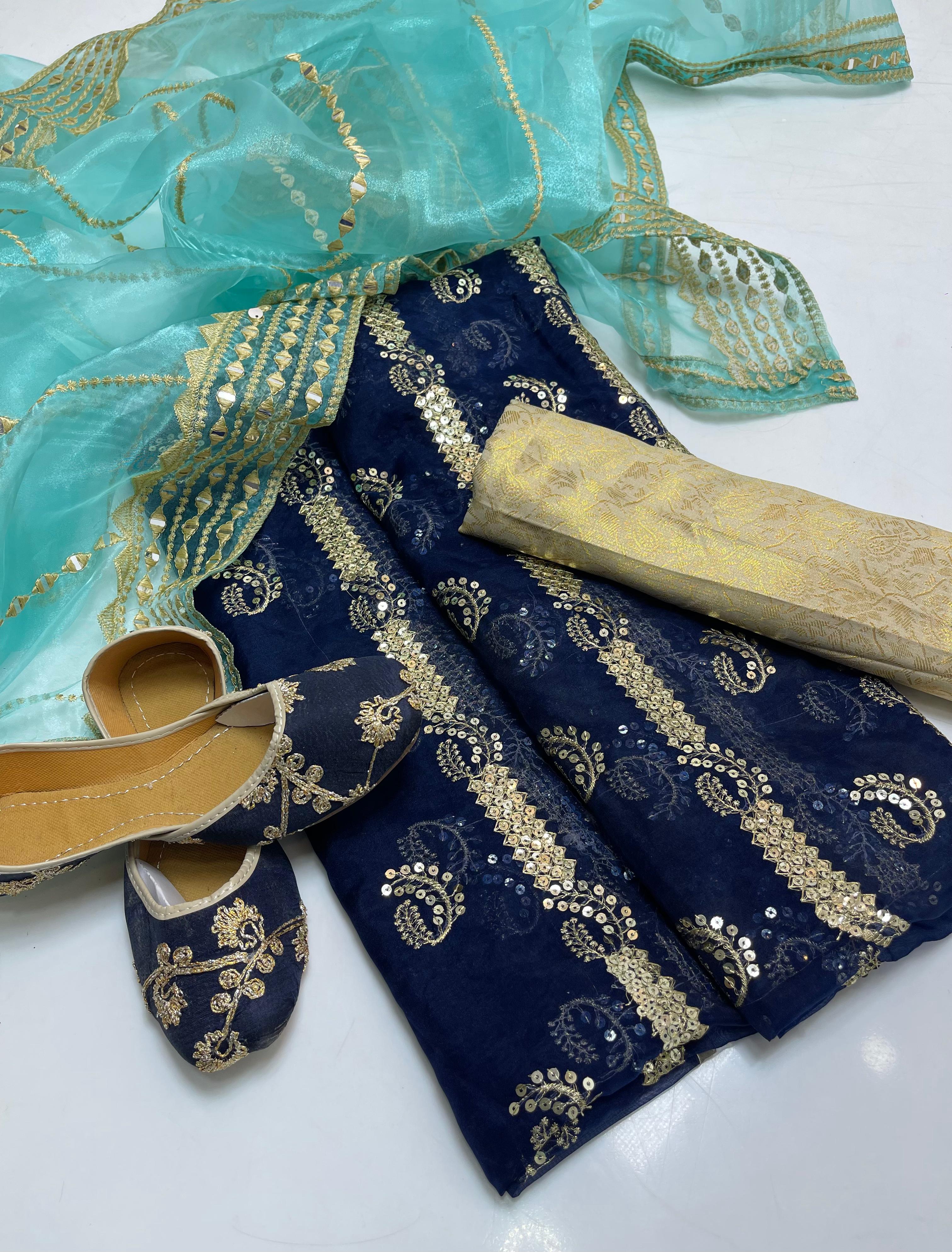 Organza embroidery front back same shirt 
Tissue beautiful embroidery work duppata 
Jamawar banarsi trouser 
With khusa