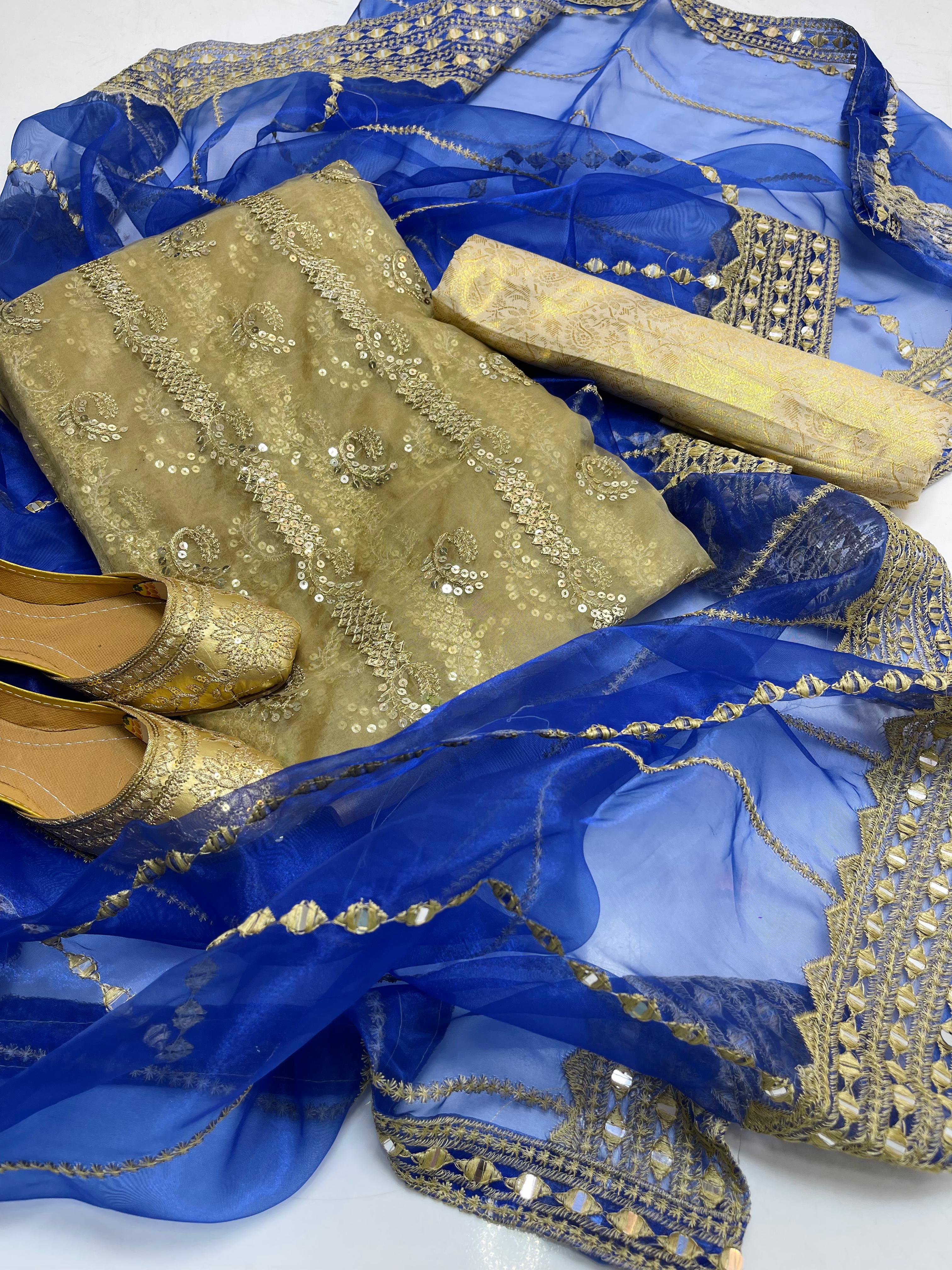 Organza embroidery front back same shirt 
Tissue beautiful embroidery work duppata 
Jamawar banarsi trouser 
With khusa