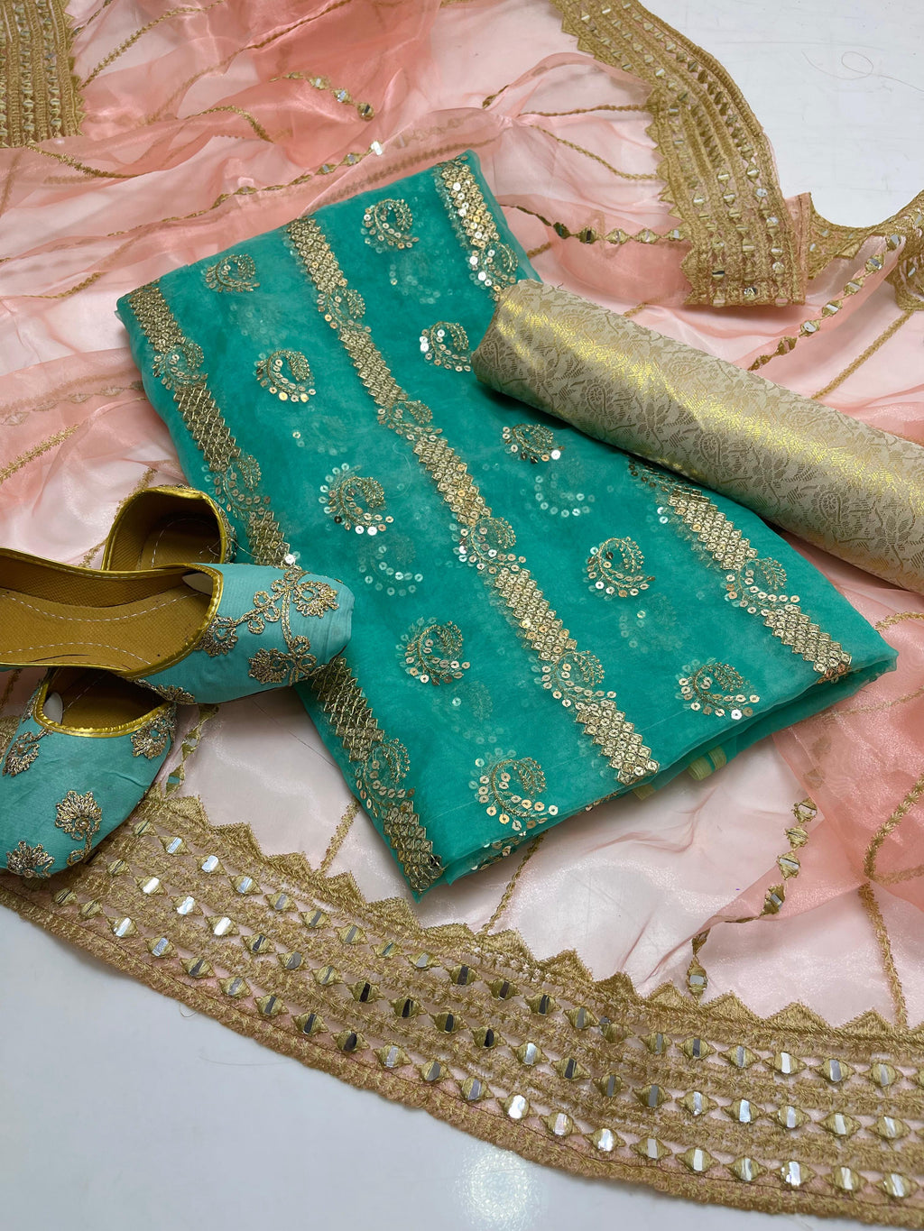 Organza embroidery front back same shirt 
Tissue beautiful embroidery work duppata 
Jamawar banarsi trouser 
With khusa