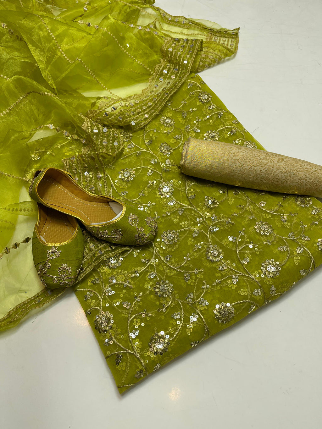 ✅Organza embroidery work shirt 
✅ tissue 9mm embroidery work duppata 
Jamawar banarsi trouser 
With beautiful khusa 
4piece dress 👗